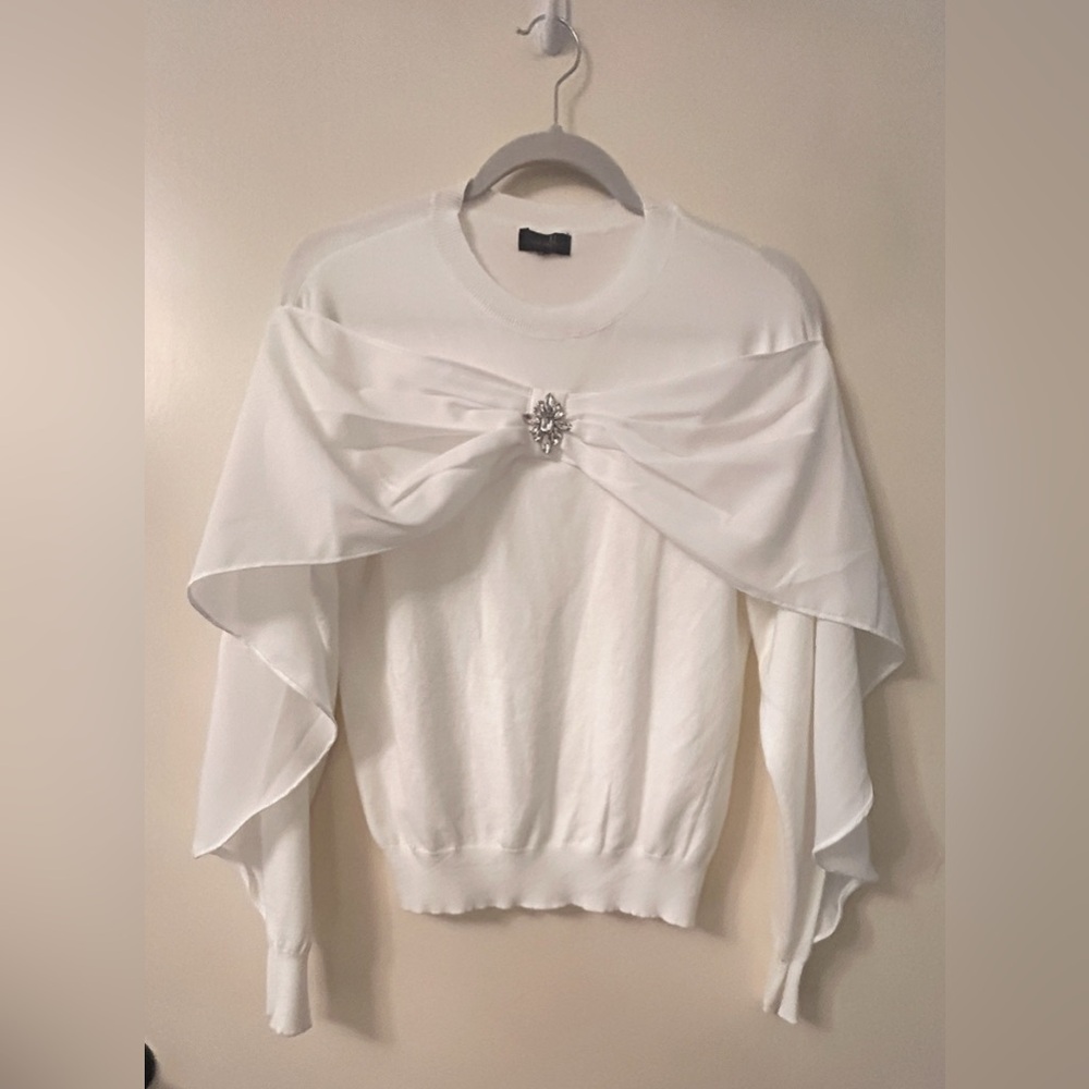 Elegant Sweater with bow draping and crystal embellishment.NWOT